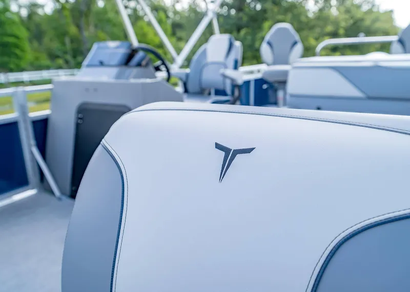 Slide: The Image of 2025 Tahoe SPORTS 85 REAR FISH boat interior with sleek seating design. - 31