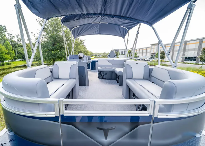 Slide: The Image of 2025 Tahoe SPORTS 85 REAR FISH pontoon boat with spacious seating and canopy. - 6