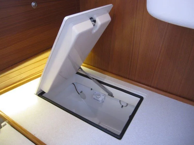 Slide: The Image of Open hatch on 2024 Catalina 385 yacht, showcasing interior storage compartment. - 11