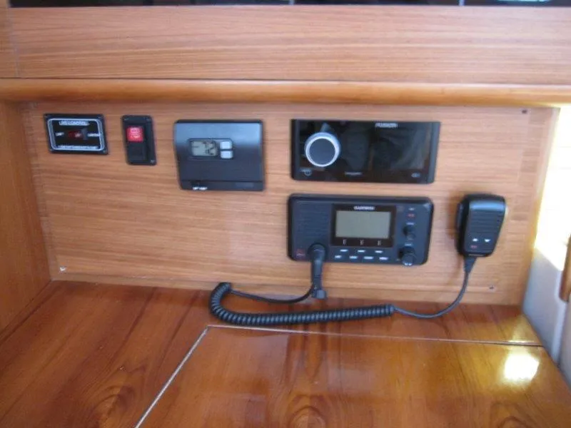 Slide: The Image of Control panel of 2024 Catalina 385 sailboat with radio and navigation equipment. - 27