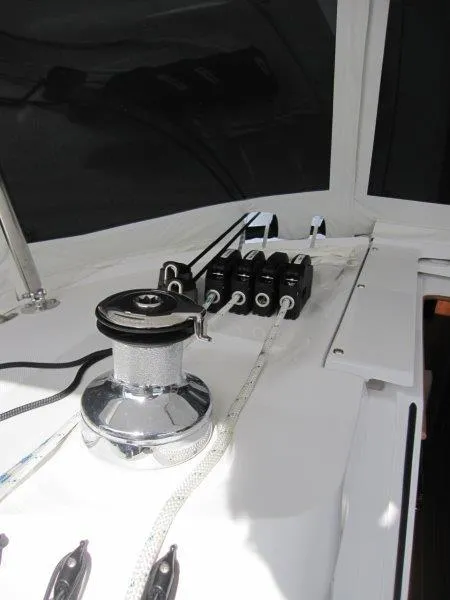 Slide: The Image of 2024 Catalina 385 sailboat deck with winch and rope clutches. - 48