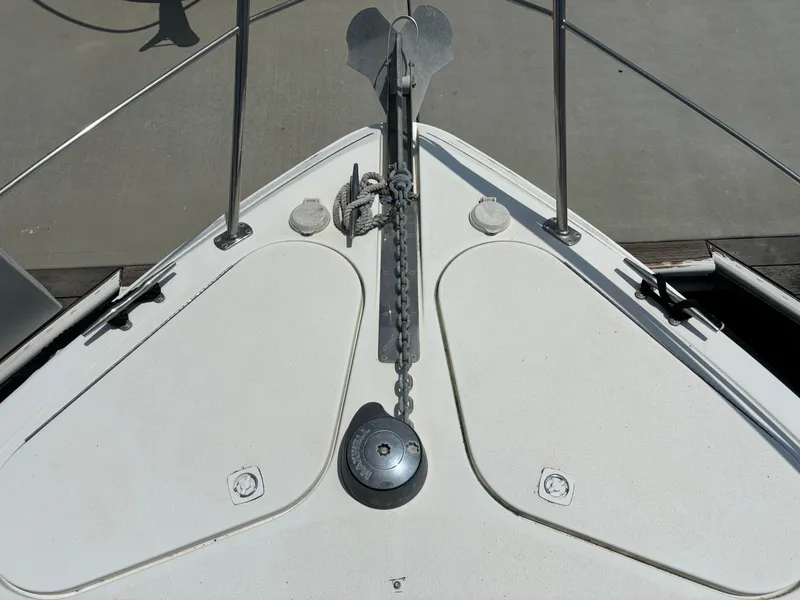 Slide: The Image of Bow of 2002 Carver 350 Mariner with anchor and chain visible. - 5