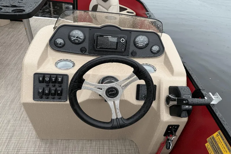 Slide: The Image of 2025 Bentley Pontoons 200 CWT FISH dashboard with steering wheel and controls. - 7