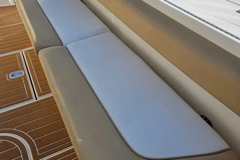 Slide: The Image of 2006 Sea Ray 580 Sedan Bridge boat seating and deck detail. - 29