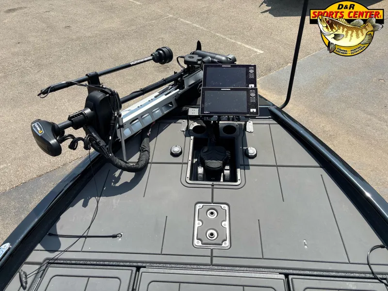 Slide: The Image of 2025 Tracker Savage 215 boat deck with fishing equipment and electronics. - 4