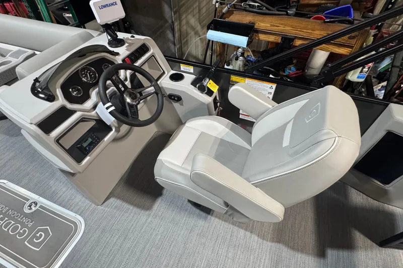 Slide: The Image of Captain's seat and helm of 2025 Godfrey Xperience EX2286SFLX pontoon boat. - 13