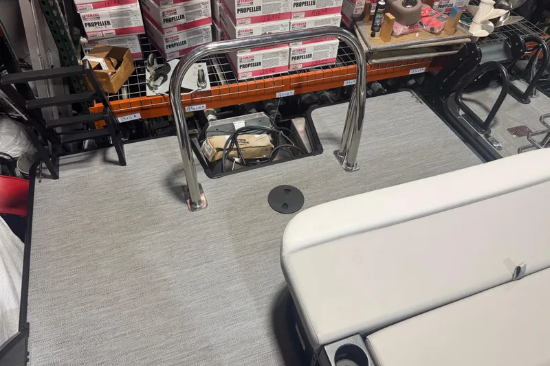 Slide: The Image of 2025 Godfrey Xperience EX2286SFLX boat deck with seating and storage area. - 18