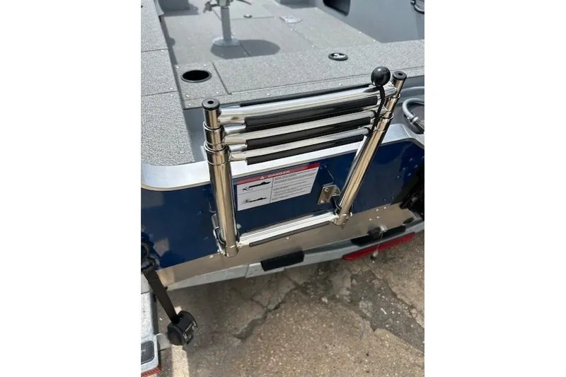 Slide: The Image of 2025 Lund 1675 Alaskan Tiller boat with stainless steel boarding ladder. - 13