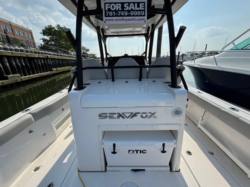 Slide: The Image of 2022 Sea Fox 328 Commander boat for sale, docked with RTIC cooler. - 36