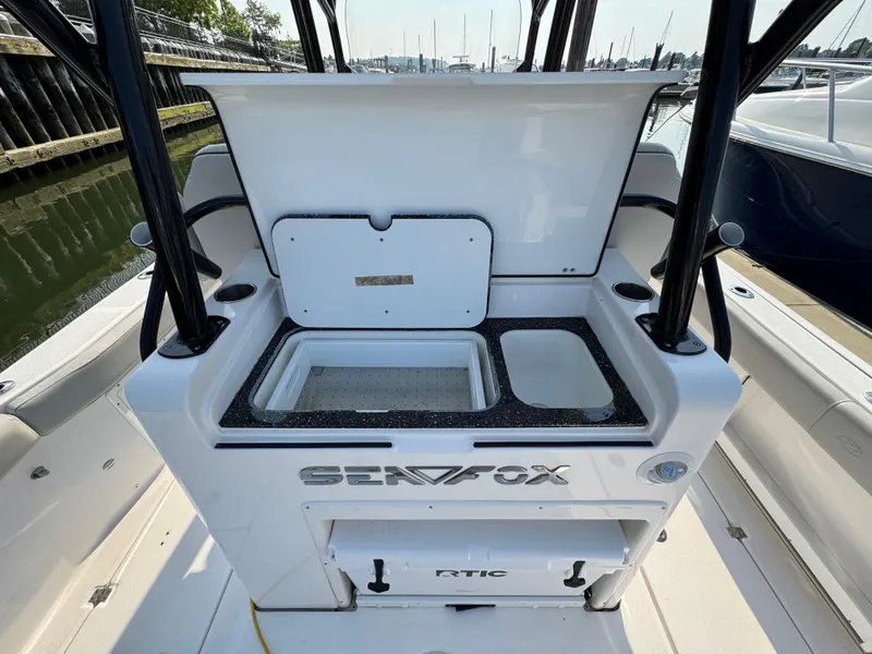Slide: The Image of 2022 Sea Fox 328 Commander boat interior with open storage compartments. - 37