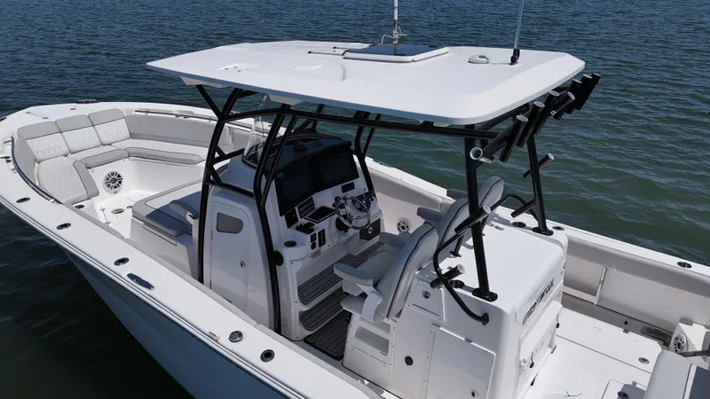 Slide: The Image of 2022 Sea Fox 328 Commander boat on water, featuring sleek design and modern amenities. - 9