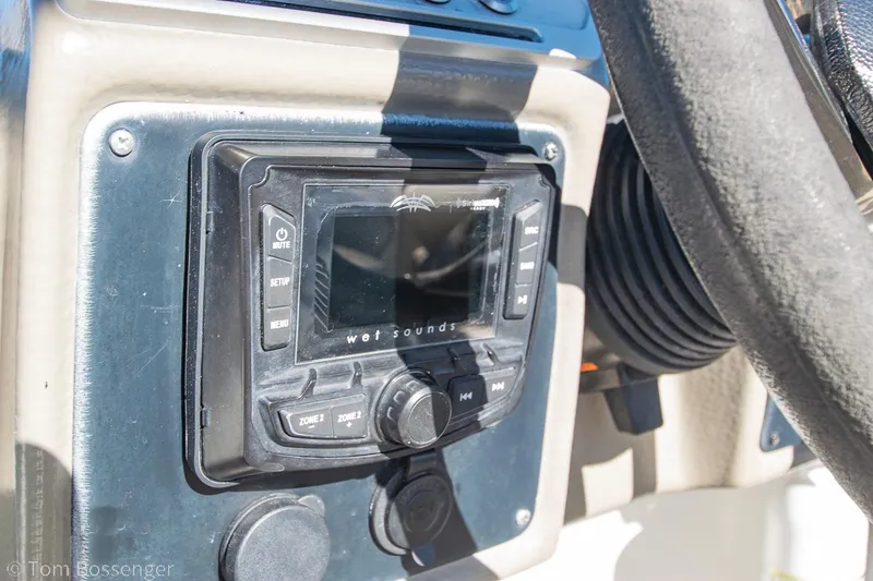 Slide: The Image of Control panel of 2021 Crownline 255 XSS boat with Wet Sounds audio system. - 15