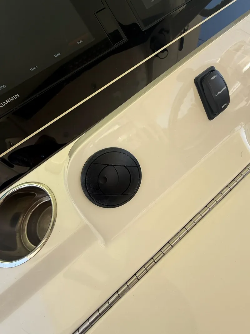 Slide: The Image of Display panel of 2019 Scout 420 LXF showing engine hours and trim levels. - 32