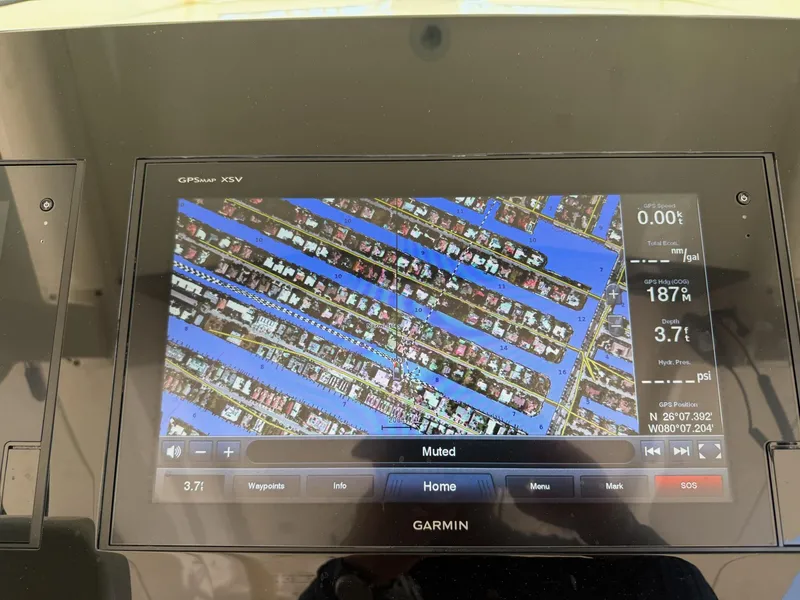 Slide: The Image of Garmin GPS display on 2019 Scout 420 LXF showing nautical map and navigation data. - 34