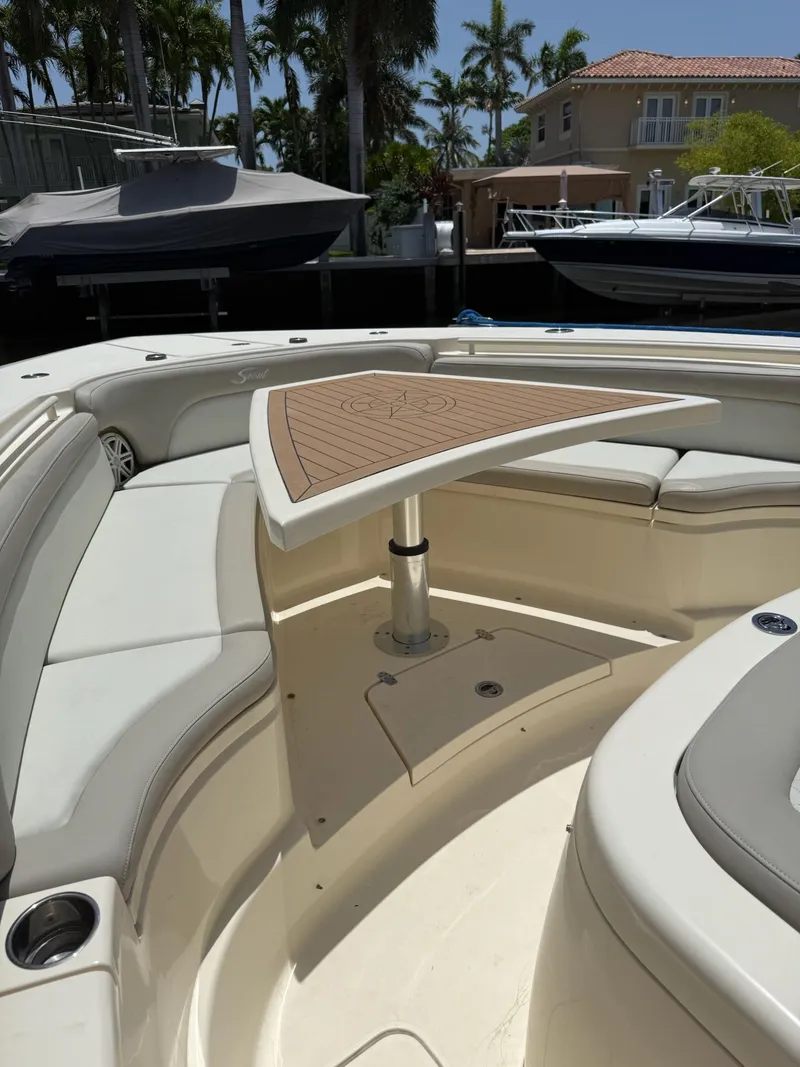 Slide: The Image of Open storage compartment on a 2019 Scout 420 LXF boat. - 40