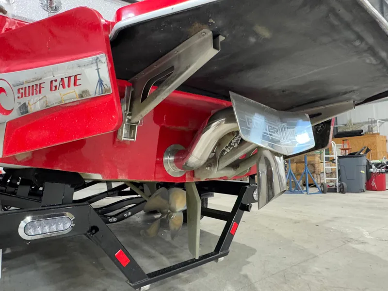 Slide: The Image of 2022 Malibu Wakesetter 23 LSV rear view with Surf Gate and Power Wedge features. - 14