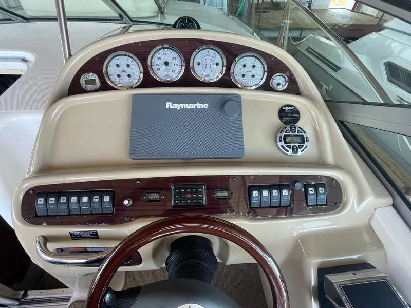 Slide: The Image of Control panel of a 2004 Chaparral Signature 290 boat with Raymarine navigation system. - 10