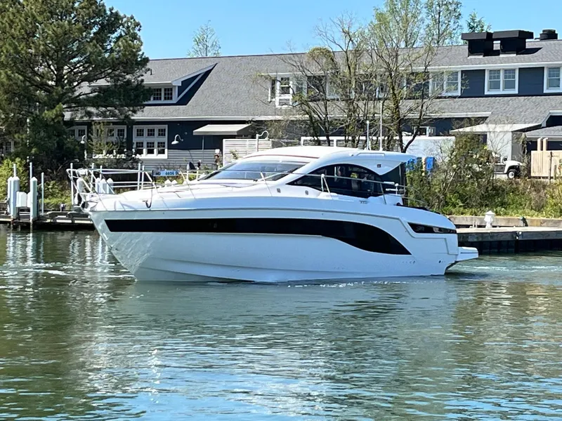 The Image of 2023 Bavaria SR41 COUPE yacht docked near waterfront building. - 0