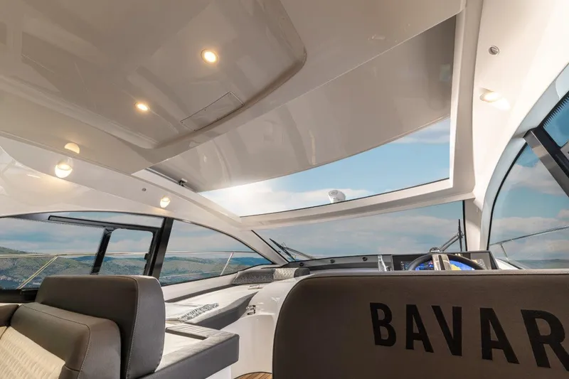 Slide: The Image of Interior view of 2023 Bavaria SR41 COUPE yacht with panoramic windows and modern design. - 15