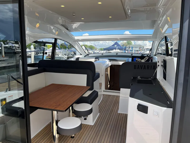 Slide: The Image of Interior of 2023 Bavaria SR41 COUPE yacht with modern seating and sleek design. - 3