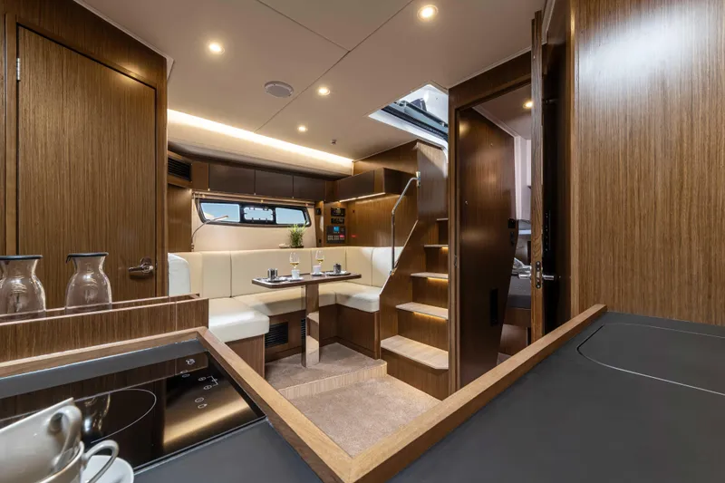 Slide: The Image of Luxurious interior of 2023 Bavaria SR41 COUPE yacht with modern wood finish. - 6