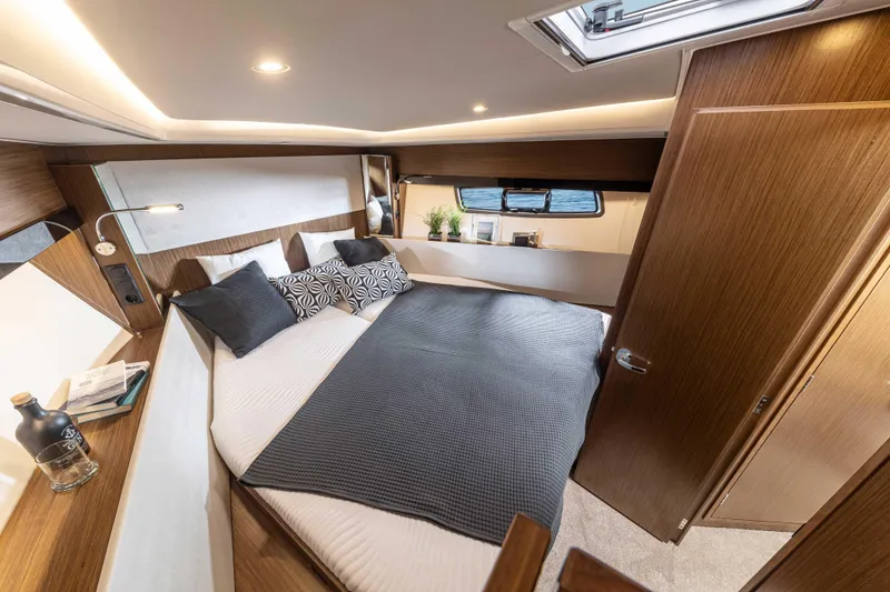 Slide: The Image of Luxurious 2023 Bavaria SR41 COUPE bedroom with modern design and cozy bedding. - 7