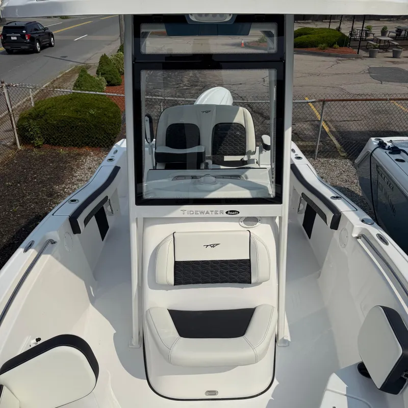 Slide: The Image of 2026 Tidewater 210CC boat interior with sleek seating and modern design. - 10