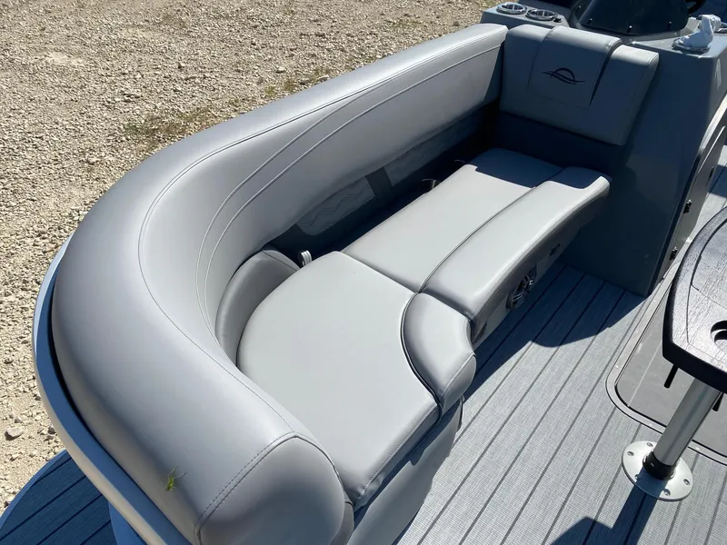 Slide: The Image of Luxurious seating on 2025 SunCatcher Fusion 324SL boat, featuring sleek gray upholstery. - 10