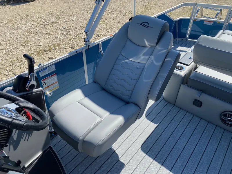 Slide: The Image of Luxurious seating on 2025 SunCatcher Fusion 324SL boat, featuring sleek design and modern controls. - 12