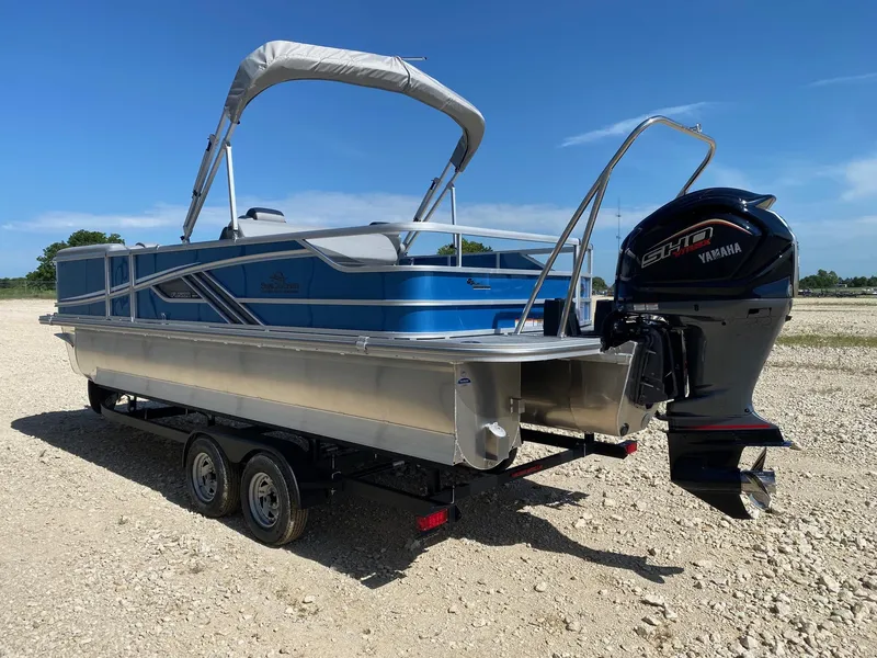 Slide: The Image of 2025 SunCatcher Fusion 324SL pontoon boat with Yamaha outboard motor on trailer. - 5