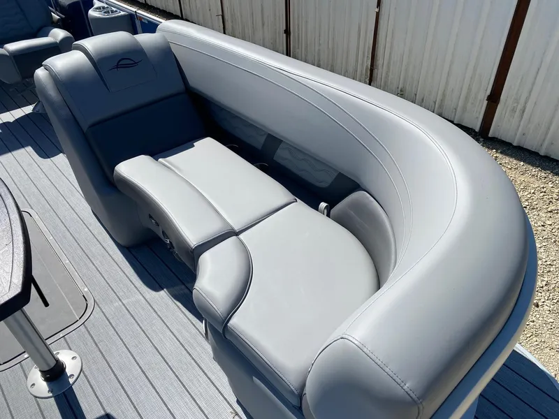 Slide: The Image of Luxurious seating on 2025 SunCatcher Fusion 324SL boat, featuring sleek gray upholstery. - 9