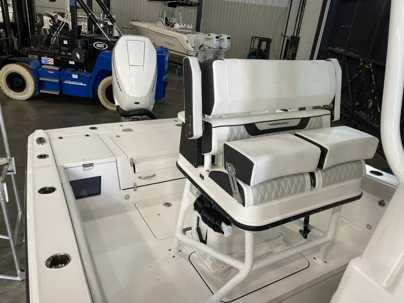 Slide: The Image of 2026 Blackfin 262 HB boat interior with white seating and modern design. - 19