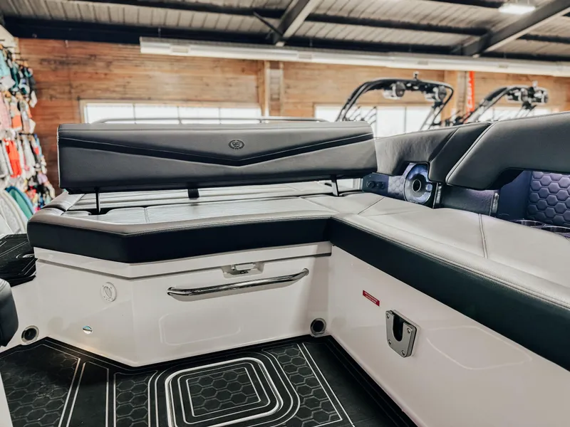Slide: The Image of 2025 Cobalt R8 Surf boat interior with sleek seating and modern design. - 10