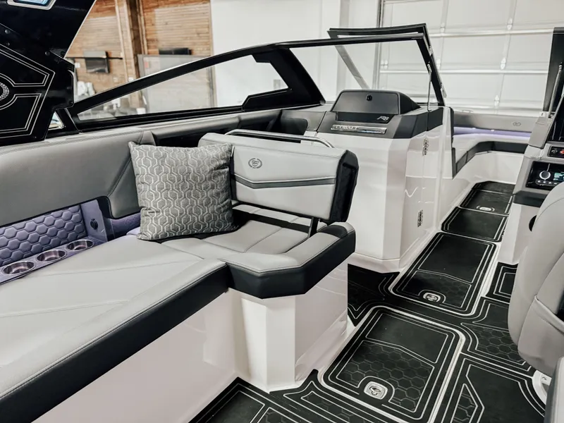 Slide: The Image of 2025 Cobalt R8 Surf boat interior with modern seating and stylish design. - 6