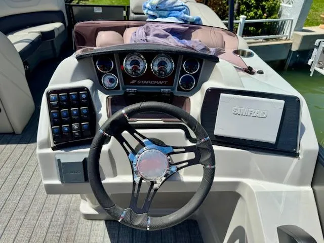 Slide: The Image of 2022 Starcraft CX 25 Q DH pontoon boat on trailer at Nautical Ventures. - 11