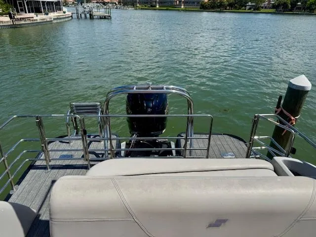 Slide: The Image of Dashboard of 2022 Starcraft CX 25 Q DH boat with gauges and controls. - 23