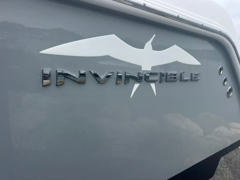 Slide: The Image of 2020 Invincible 39 Open Fisherman boat logo with bird silhouette on hull. - 15