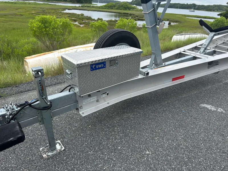 Slide: The Image of Trailer for 2020 Invincible 39 Open Fisherman near scenic waterway. - 20
