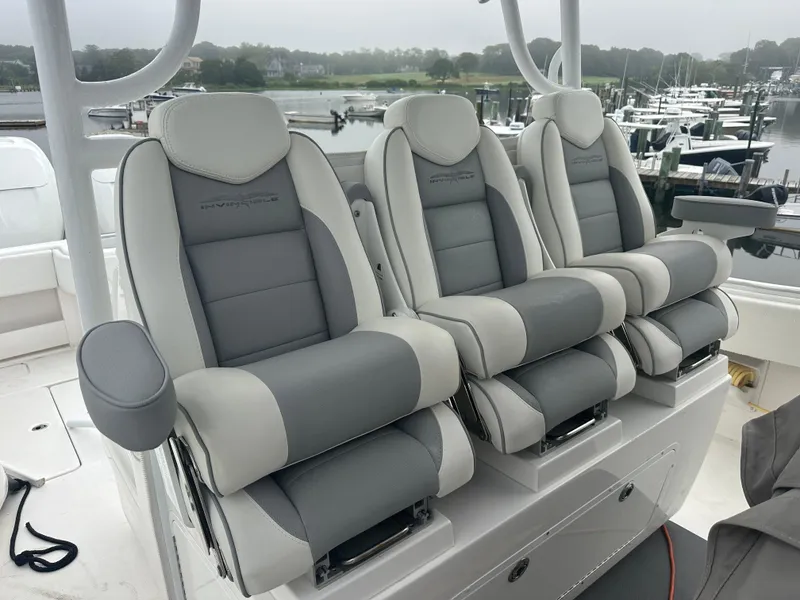 Slide: The Image of Three luxurious seats on a 2020 Invincible 39 Open Fisherman boat. - 9