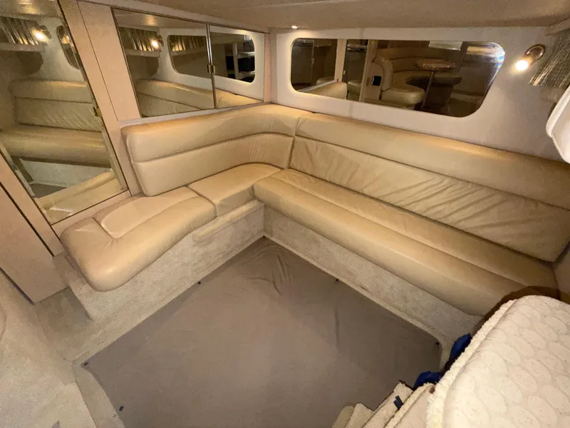 Slide: The Image of Luxurious interior of 2003 Sea Ray 380 Sundancer yacht with beige leather seating. - 42