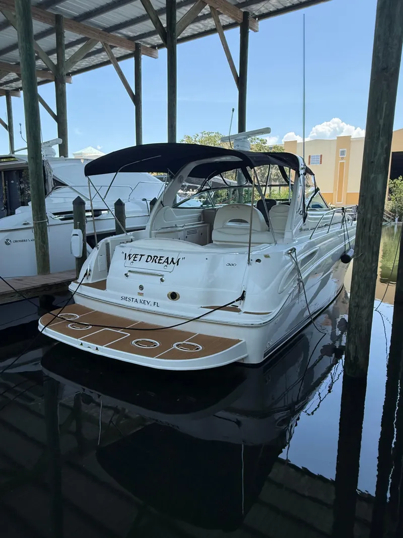 Slide: The Image of 2003 Sea Ray 380 Sundancer docked in Siesta Key, Florida under a covered marina. - 6