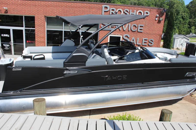 The Image of 2025 Tahoe Pontoon Cascade Quad Lounge Windshield at dealership, showcasing sleek design and modern features. - 1