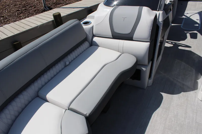 Slide: The Image of 2025 Tahoe Pontoon Cascade Quad Lounge Windshield interior with sleek, modern seating design. - 11