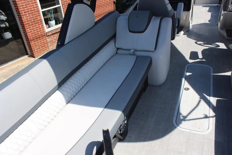 Slide: The Image of 2025 Tahoe Pontoon Cascade Quad Lounge Windshield interior with sleek seating and modern design. - 15