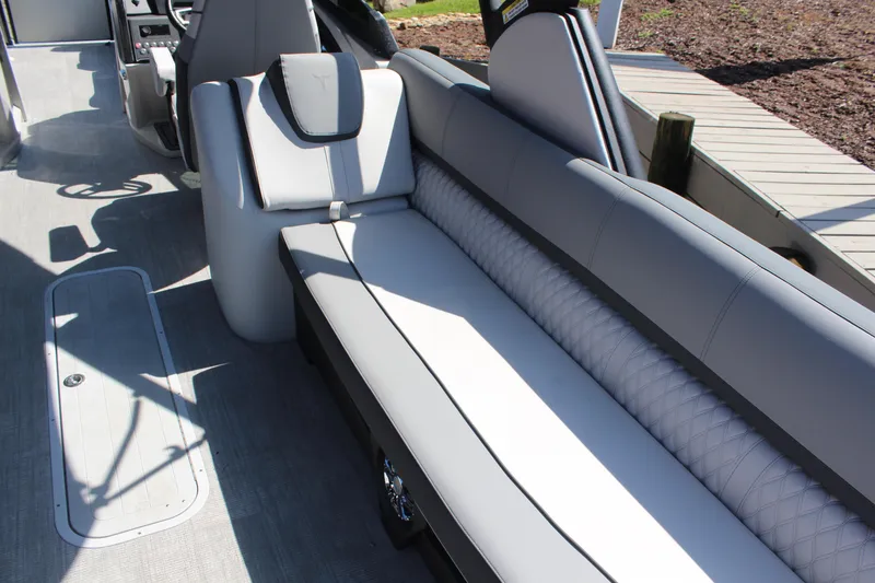 Slide: The Image of 2025 Tahoe Pontoon Cascade Quad Lounge Windshield interior with luxurious seating and modern design. - 5