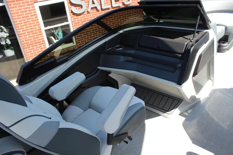Slide: The Image of 2025 Tahoe Pontoon Cascade Quad Lounge Windshield interior with modern seating and sleek design. - 9