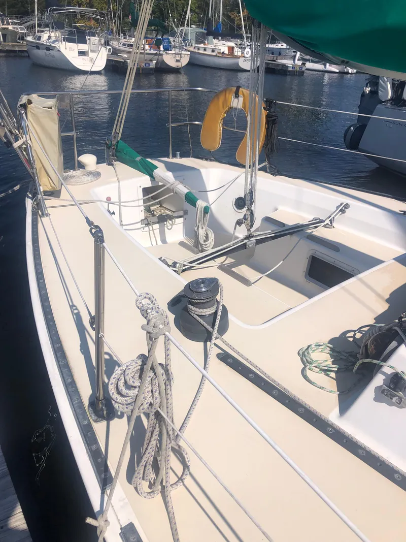 Slide: The Image of 1987 J Boats J29 sailboat docked, featuring deck and rigging details. - 4