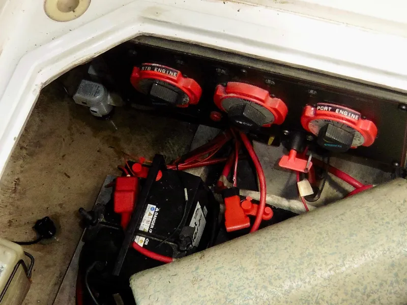 Slide: The Image of Engine compartment of 1992 Bayliner 3288 Motoryacht with battery and switches. - 30