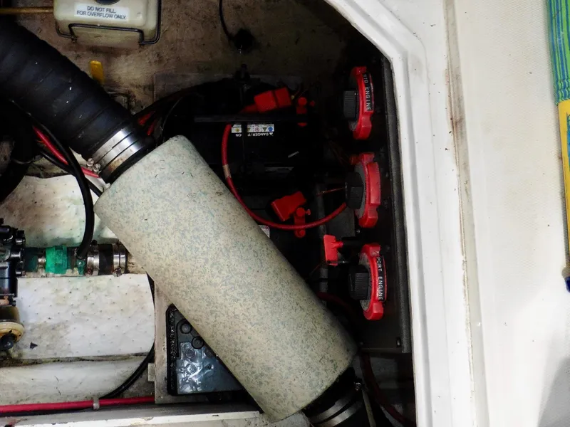 Slide: The Image of Engine compartment of a 1992 Bayliner 3288 Motoryacht with visible components and wiring. - 31