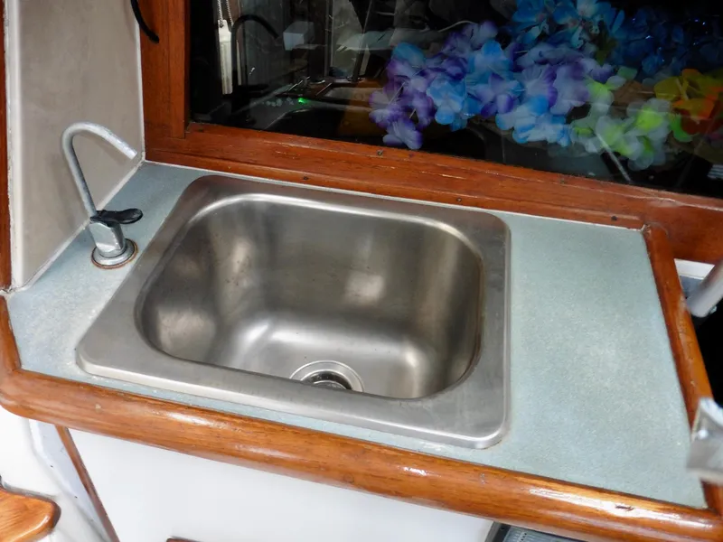 Slide: The Image of Stainless steel sink on 1992 Bayliner 3288 Motoryacht with wooden trim. - 41